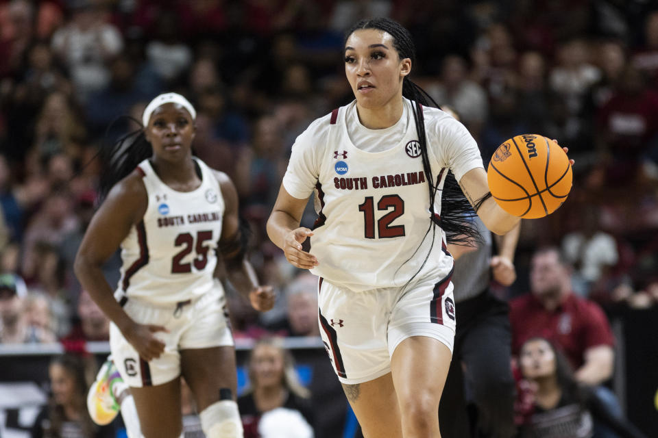 South Carolina's Brea Beal (12) brings the ball upcourt against Maryland in the second half of an Elite 8 college basketball game of the NCAA Tournament in Greenville, S.C., Monday, March 27, 2023. (AP Photo/Mic Smith)