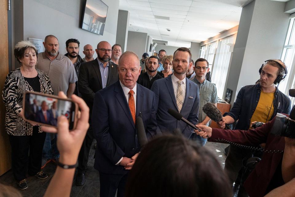 Defense attorneys Doug O’Connell and Ken Ervin speak to members of the media after Austin police officer Christopher Taylor's murder trial was declared a mistrial Wednesday.