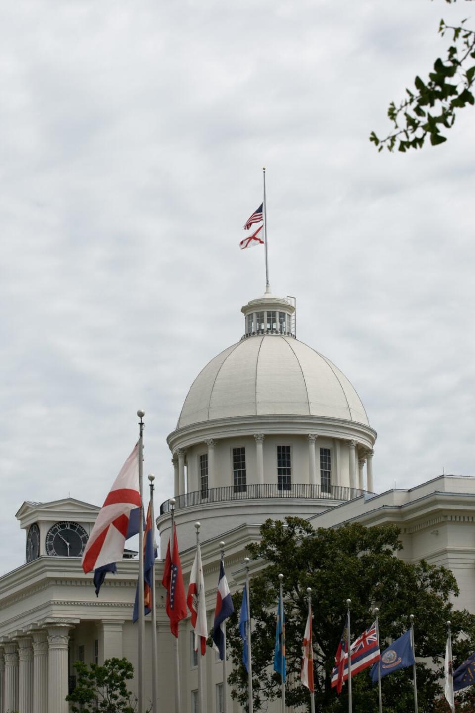 Flags fly at half-staff over the Alabama State Capitol where civil rights icon, former US Rep. John Lewis (D-GA) lies in state on July 26, 2020 in Montgomery, Alabama. (Photo by Jessica McGowan/Getty Images)