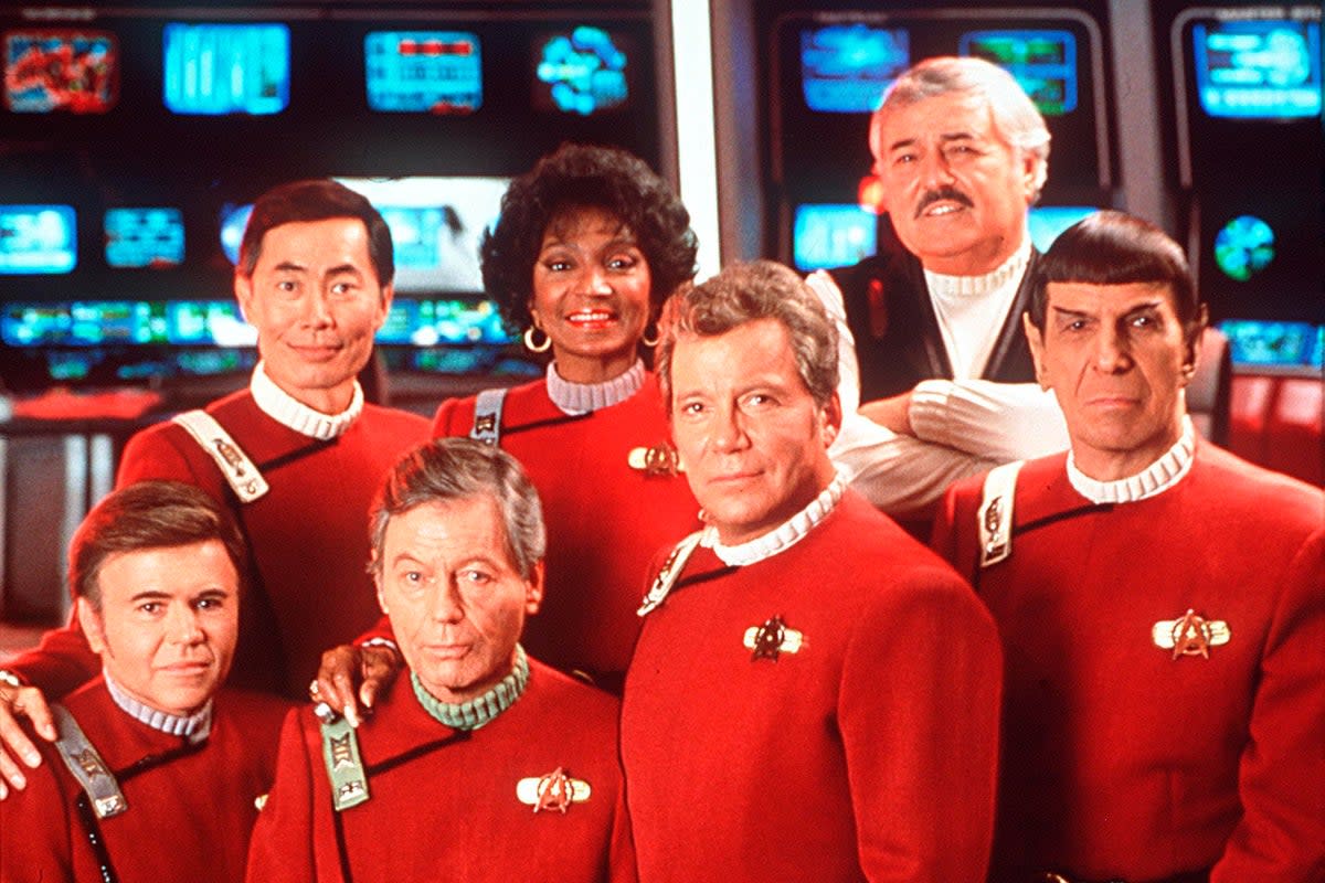 The cast of Star Trek in 1991, with Takei pictured top left, and Shatner bottom row, second from right  (Five)