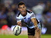 NRL veteran John Morris announced his retirement due to a neck injury after playing 300 matches.