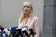 Sigrid McCawley, an attorney representing some of alleged victim of Jeffery Epstein, speaks to reporters in front of a courthouse in New York, Thursday, July 18, 2019. A judge denied bail Thursday for jailed financier Jeffrey Epstein on sex trafficking charges after prosecutors argued the jet-setting defendant is a danger to the public and might flee the country. (AP Photo/Seth Wenig)