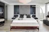 <p>What's black and white and chic all over? This mid-century modern-inspired bedroom from <a href="https://www.chairish.com/shop/eolo-a-i-design" rel="nofollow noopener" target="_blank" data-ylk="slk:Eolo A&I Design;elm:context_link;itc:0;sec:content-canvas" class="link ">Eolo A&I Design</a>.</p>