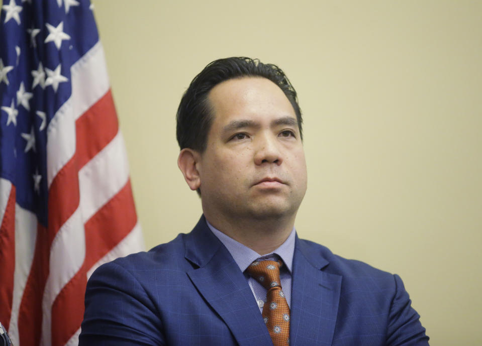 FILE - In this Feb. 23, 2017, file photo, Utah Attorney General Sean Reyes looks on during a news conference at the Utah State Capitol in Salt Lake City. In a Wednesday, Oct. 9, 2019 statement, Reyes said Maricopa County, Ariz., Assessor Paul Petersen "is alleged to have run an illegal adoption scheme where he recruited, transported, and offered payment to pregnant Marshallese women to give their babies up for adoption in the United States." (AP Photo/Rick Bowmer, File)