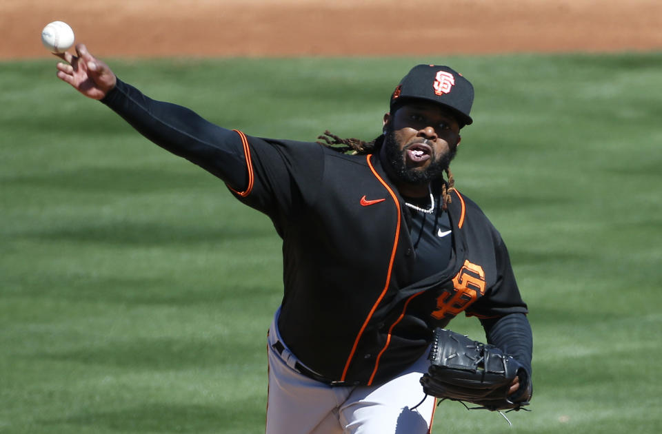 TEMPE, ARIZONA - MARCH 11: Starting pitcher Johnny Cueto #47 of the San Francisco Giants throws against the Los Angeles Angels during the second inning of the MLB spring training baseball game at Tempe Diablo Stadium on March 11, 2021 in Tempe, Arizona. (Photo by Ralph Freso/Getty Images)