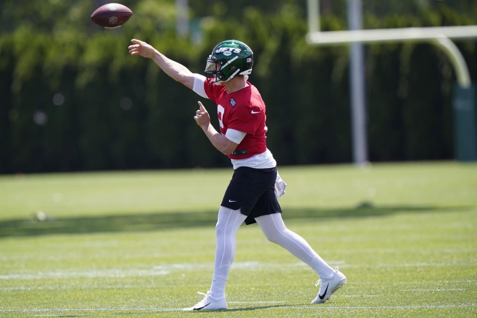 New York Jets quarterback Zach Wilson passes during NFL football practice Thursday, May 27, 2021, in Florham Park, N.J. (AP Photo/Kathy Willens)