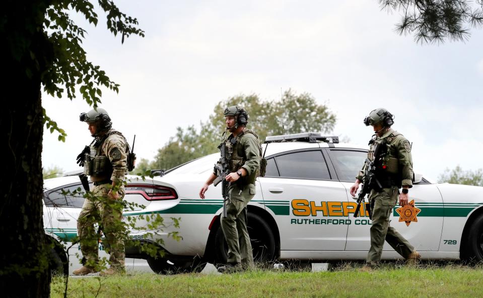 Rutherford County Sheriff's deputies will see their pay tables increase by 20% starting in July. This file photo from Oct. 10, 2018, shows deputies searching wooded areas for two escaped inmates along Baker Road Wednesday.