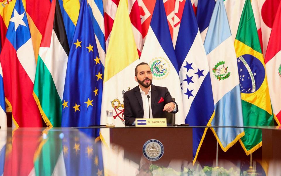 El Salvadoran President Nayib Bukele talks during a meeting with ambassadors accredited in his country at the National Palace in San Salvador - AFP