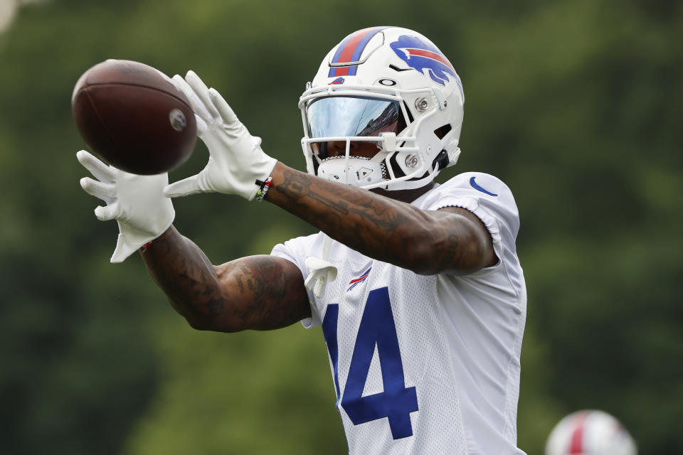 Buffalo Bills receiver Stefon Diggs (14) makes a catch during practice at the NFL football team's training camp in Pittsford, N.Y., Sunday July 24, 2022. (AP Photo/ Jeffrey T. Barnes)