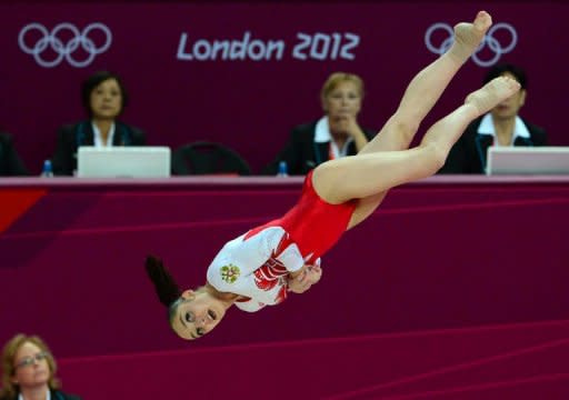 Russia's gymnast Aliya Mustafina performs during the women' s floor exercise final of the artistic gymnastics event of the London Olympic Games at the 02 North Greenwich Arena in London. Mustafina got bronze