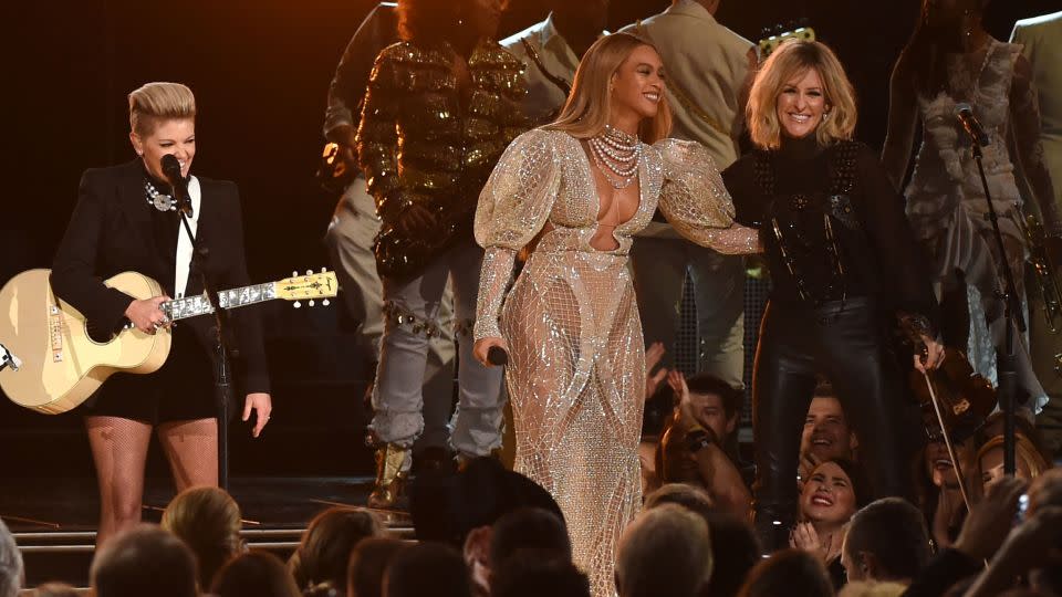Beyonce performs onstage with Martie Maguire of Dixie Chicks at the 50th annual CMA Awards in 2016. - Rick Diamond/Getty Images
