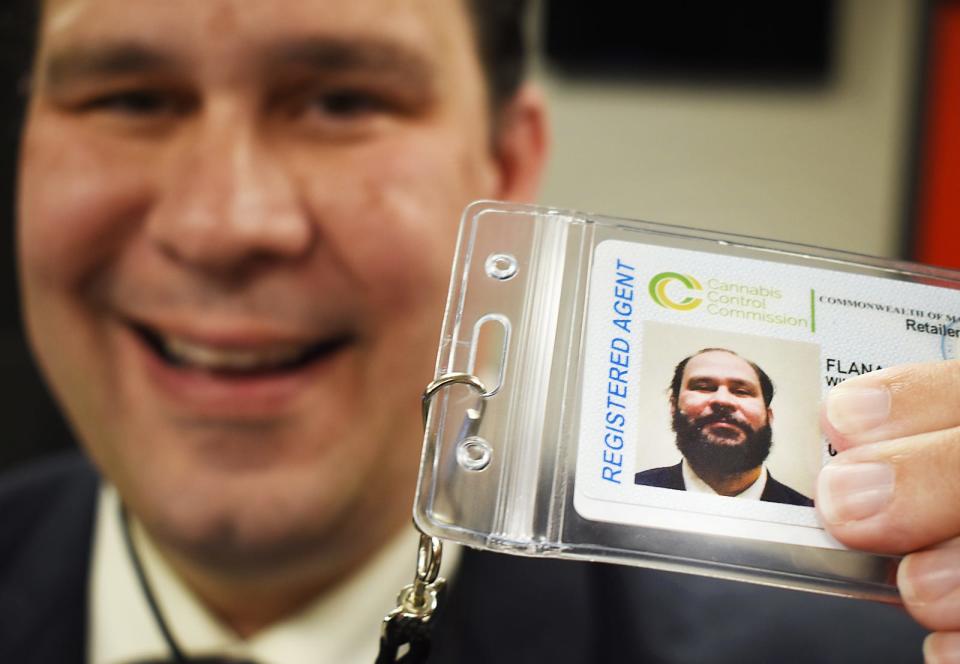 Will Flanagan with his card from the Cannabis Control Commission.