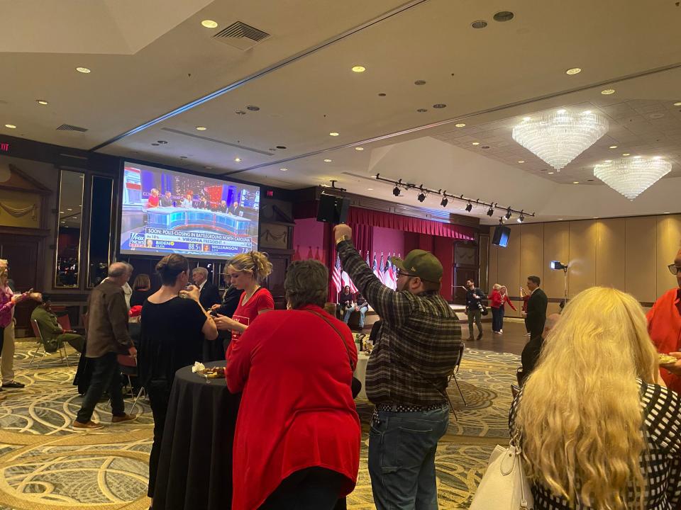 Mark Robinson watch party attendees cheer at election results rolling in in Greensboro, N.C. 2024 North Carolina primary election