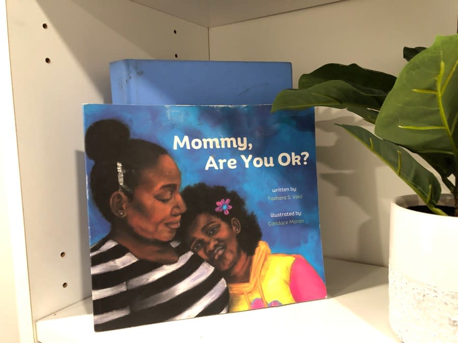 A book displayed at The Village Place in northeast Austin. (KXAN Photo/Arezow Doost) 