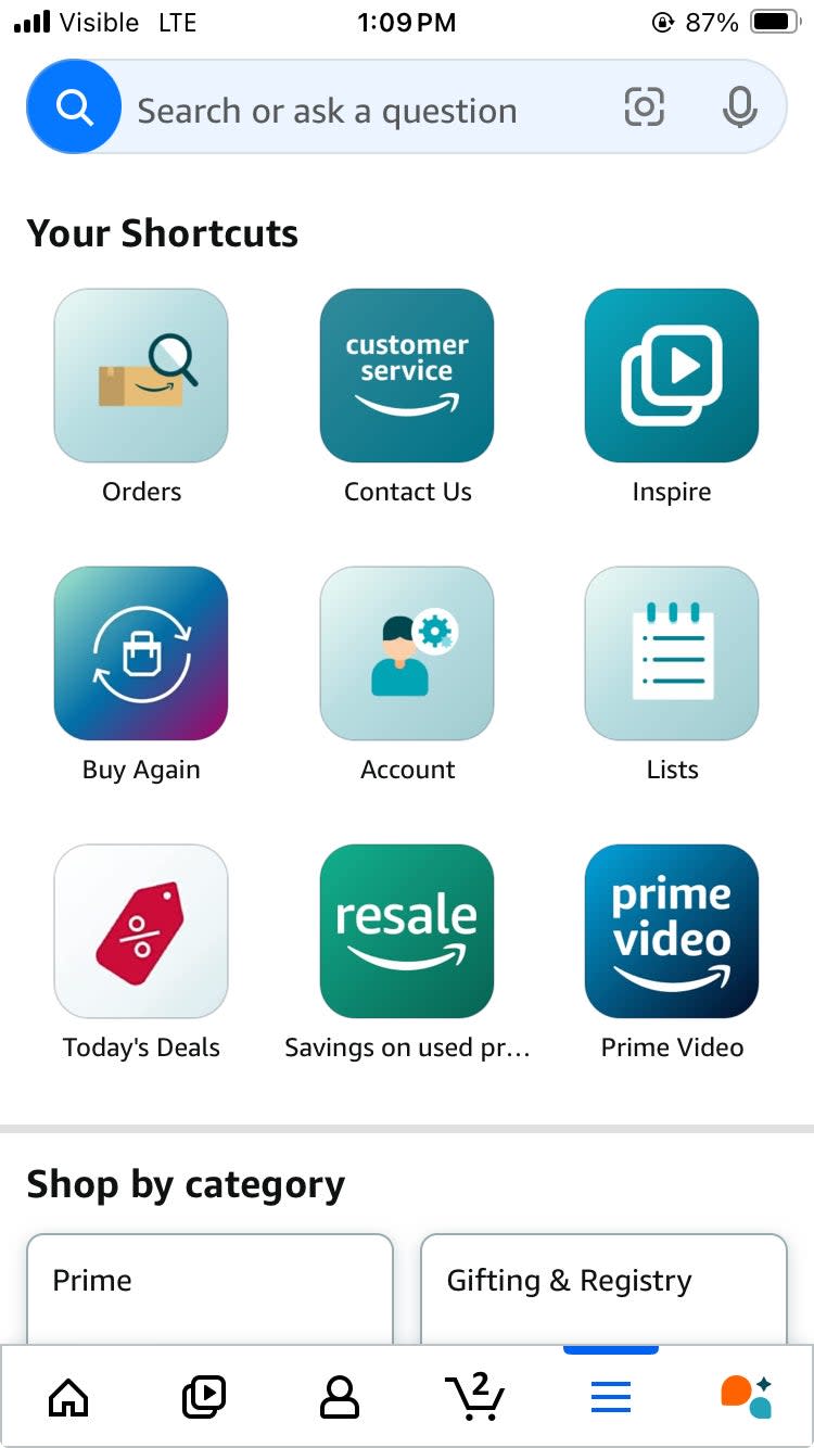 Screenshot of a mobile app's main menu showing various shortcuts including Orders, Contact Us, Inspire, Buy Again, Account, Lists, Today's Deals, Resale, and Prime Video