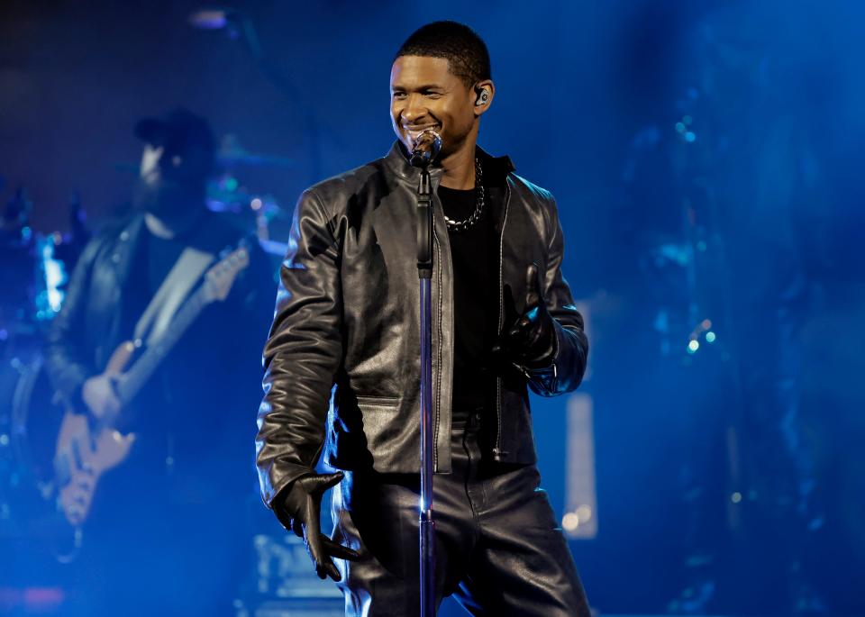 In this image released on Aug. 2, 2023, Usher performs onstage during a taping of iHeartRadio’s Living Black 2023 Block Party in Inglewood, California.