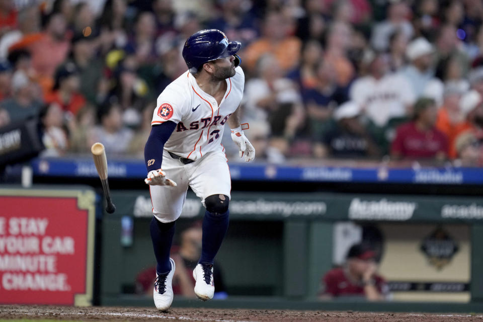 Houston Astros' Jose Altuve watches his solo home run against the Arizona Diamondbacks during the seventh inning of a baseball game Saturday, Sept. 7, 2024, in Houston. (AP Photo/Eric Christian Smith)