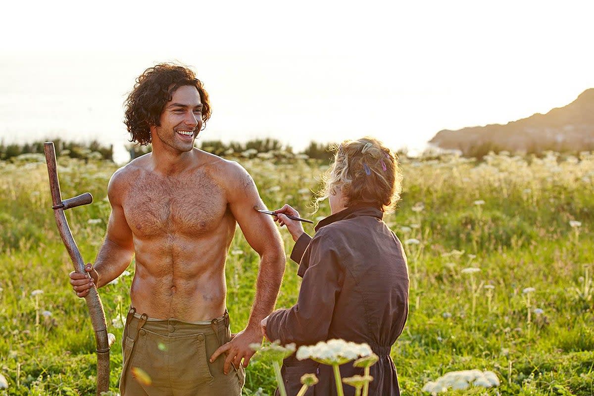 Aidan Turner has clarified he never felt “objectified” by the topless photo of him during the filming of Poldark (BBC/PA) (PA Media)