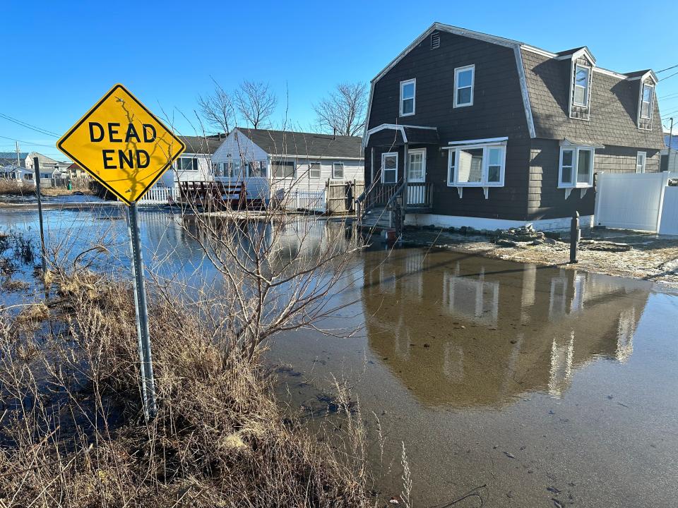 Water is still high on a dead-end road off Brown Avenue at Hampton Beach Monday, Jan. 15, 2024, following a storm and flooding that occurred Saturday.