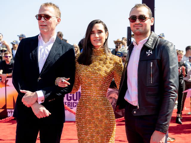 <p>Emma McIntyre/WireImage</p> Paul Bettany, Jennifer Connelly and Kai Dugan attend the 'Top Gun: Maverick' world premiere on May 04, 2022 in San Diego, California.