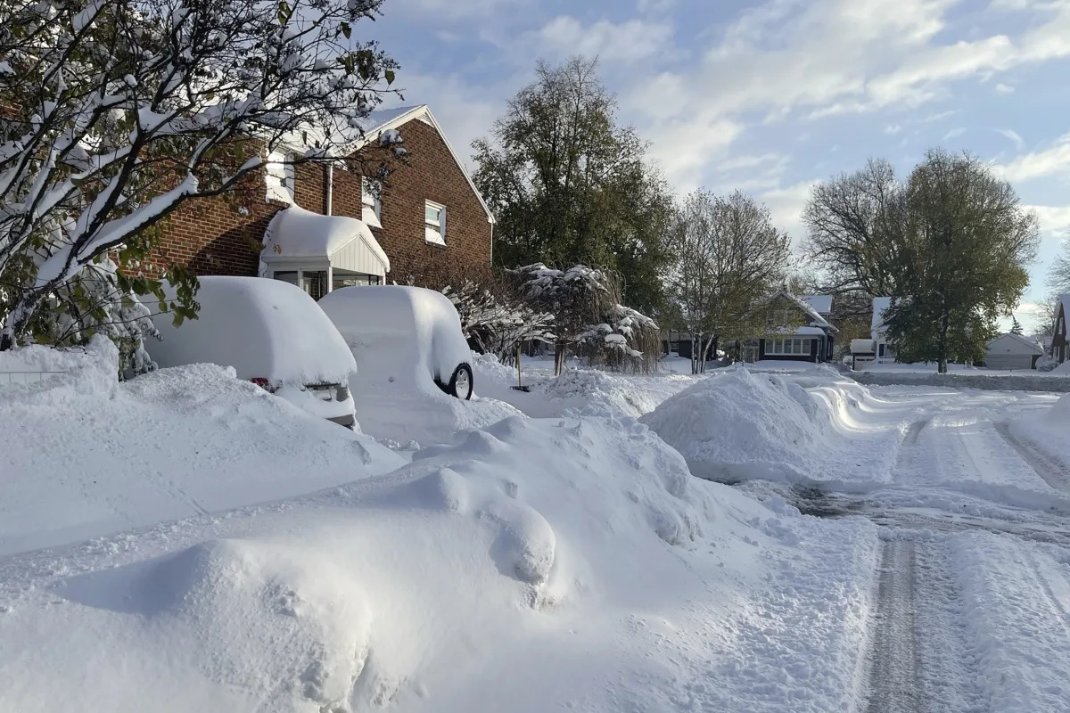 Massive snowfall buries cars, keeps falling in western NY