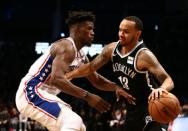 Nov 25, 2018; Brooklyn, NY, USA; Philadelphia 76ers forward Jimmy Butler (23) defends against Brooklyn Nets guard Shabazz Napier (13) in the fourth quarter at Barclays Center. Mandatory Credit: Nicole Sweet-USA TODAY Sports