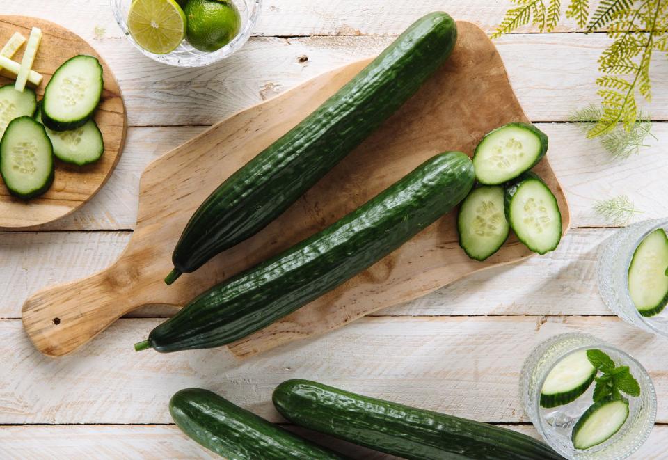 cucumber sliced on the cutting board, salad ingredient