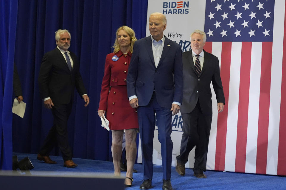 President Joe Biden, second from right, and members of the Kennedy family including Maxwell Kennedy Sr., from left, Kerry Kennedy and Christopher Kennedy walk on stage at a campaign event, Thursday, April 18, 2024, in Philadelphia. (AP Photo/Alex Brandon)