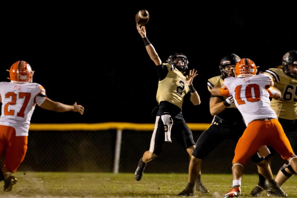 Buchholz Bobcats quarterback Creed Whittemore (2) throws the ball during the first half against the University Titans at Citizens Field in Gainesville, FL on Friday, November 19, 2021.