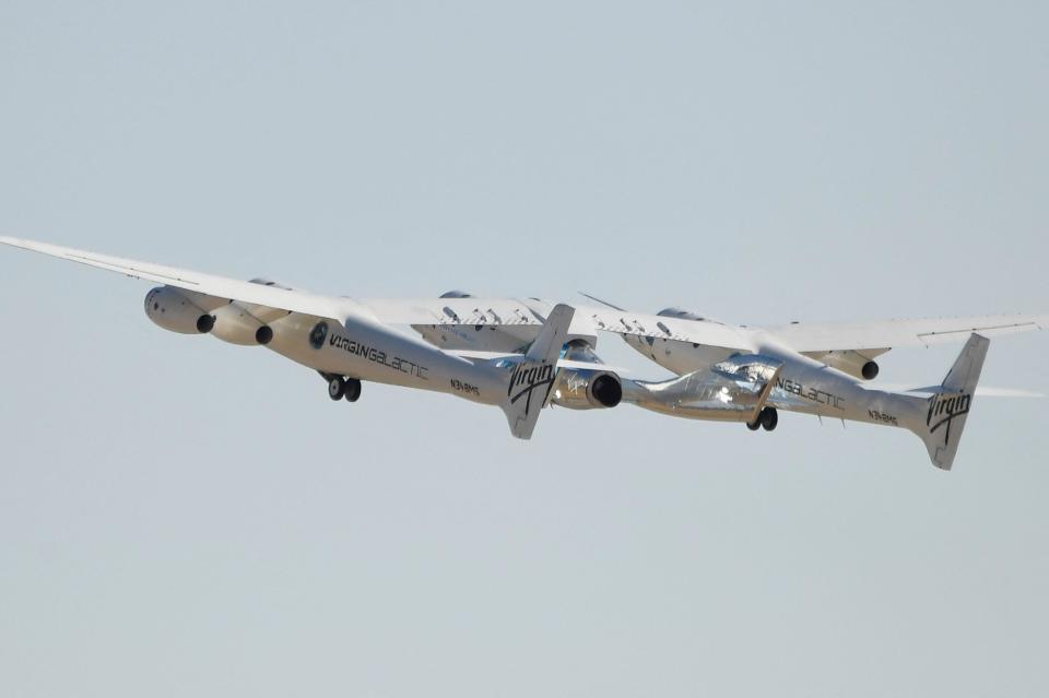 The Virgin Galactic carrier plane, carrying the VSS Unity spaceplane Unity, took off at Spaceport America, near Truth and Consequences, New Mexico, on July 11, 2021, with a crew of 6 including billionaire owner Richard Branson. / Credit: PATRICK T. FALLON/AFP via Getty Images