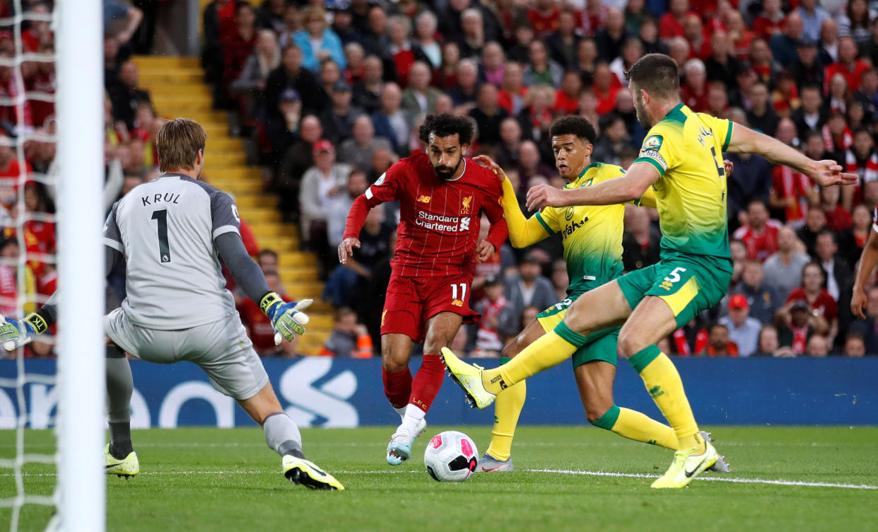 Soccer Football - Premier League - Liverpool v Norwich City - Anfield, Liverpool, Britain - August 9, 2019   Liverpool's Mohamed Salah scores their second goal    Action Images via Reuters/Carl Recine    EDITORIAL USE ONLY. No use with unauthorized audio, video, data, fixture lists, club/league logos or "live" services. Online in-match use limited to 75 images, no video emulation. No use in betting, games or single club/league/player publications.  Please contact your account representative for further details.