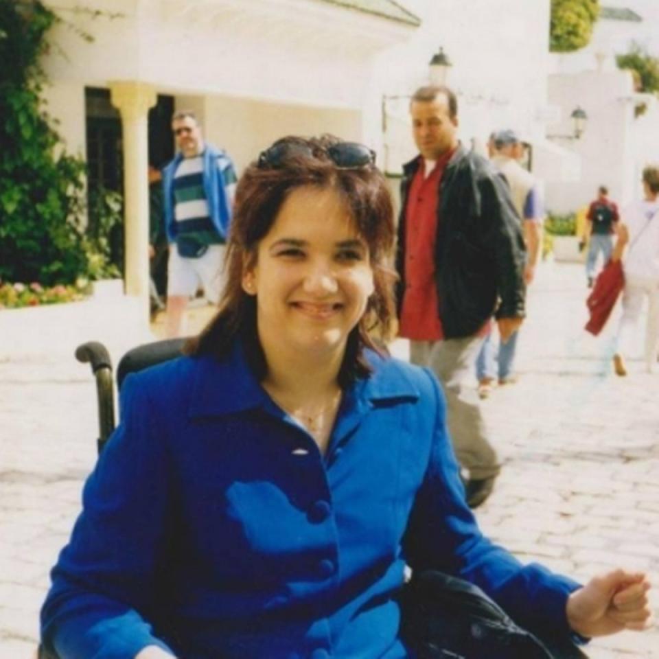 Woman sitting in a wheelchair