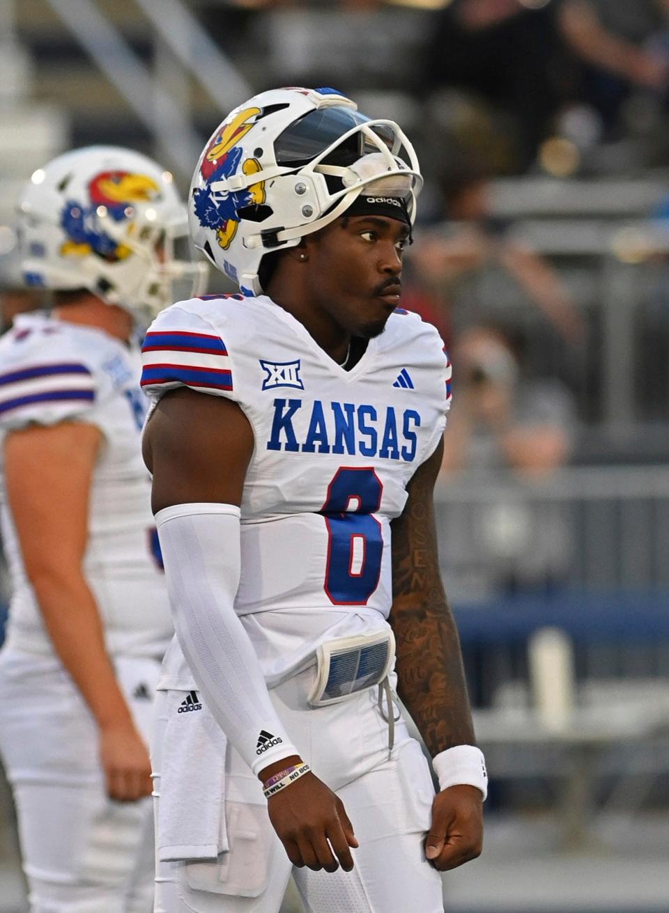 Kansas quarterback Jalon Daniels walks on the field before the team's game against Nevada on Sept. 16 earlier this year in Reno, Nevada.