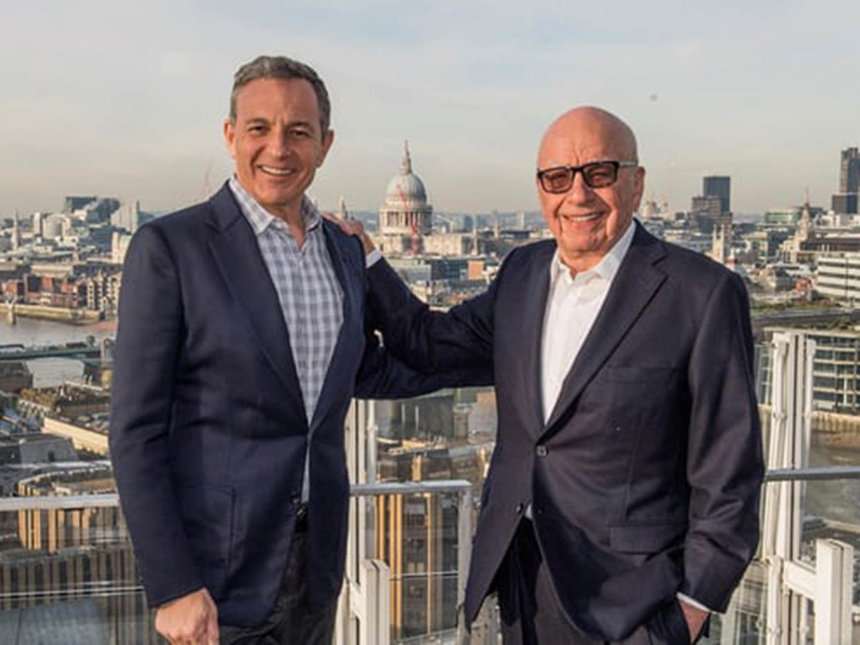 Disney chairman Robert Iger with Rupert Murdoch. The company is preparing to invest in its own streaming platform, leveraging its vast catalogue of exclusive films, TV shows and sports rights: Disney