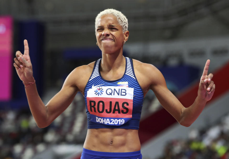 Yulimar Rojas, of Venezuela, grimaces after a jump while competing in the women's triple jump final at the World Athletics Championships in Doha, Qatar, Saturday, Oct. 5, 2019. (AP Photo/Hassan Ammar)