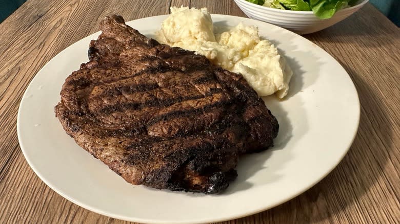 steak dinner mashed potatoes salad