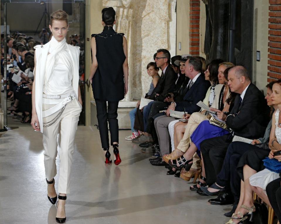 A model wears a creation by fashion designer Bouchra Jarrar during her Women's Fall Winter 2013-2014 haute couture fashion collection presented at Antoine Bourdelle Museum in Paris Tuesday, July 2, 2013 in Paris. (AP Photo/Jacques Brinon)