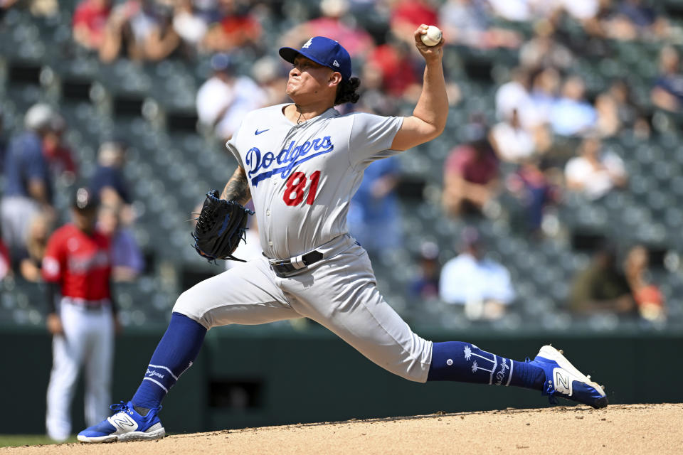 Los Angeles Dodgers relief pitcher Victor Gonzalez delivers during the third inning in the continuation of a suspended baseball game against the Cleveland Guardians, Thursday, Aug. 24, 2023, in Cleveland. The game was suspended the night before due to inclement weather. (AP Photo/Nick Cammett)