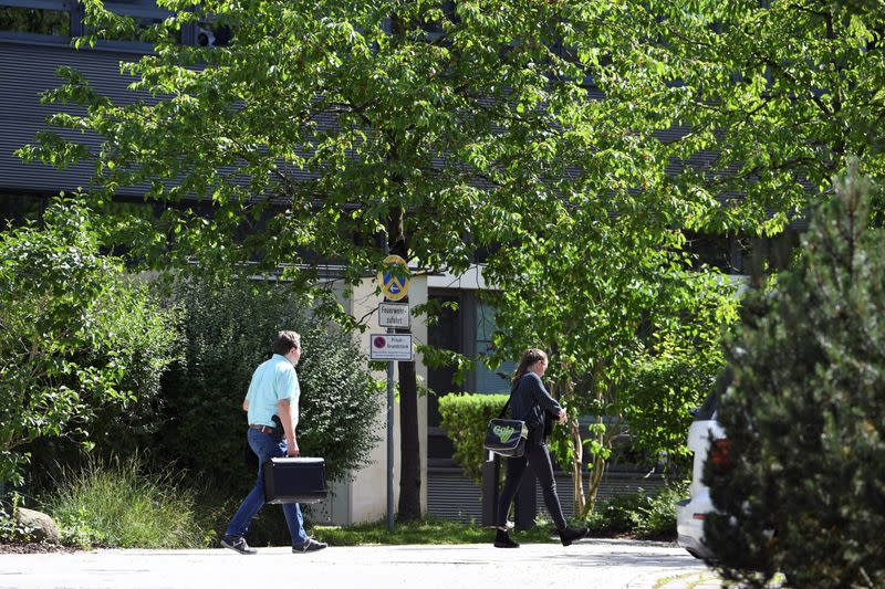 People enter the headquarters of Wirecard AG in Aschheim