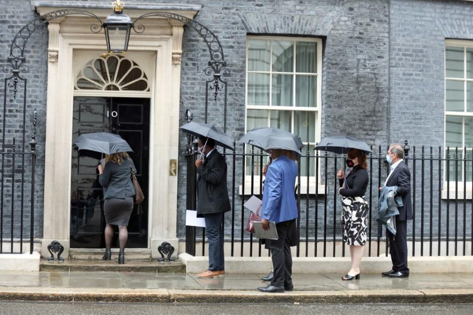 Members of the Covid-19 Bereaved Families for Justice group arrive in Downing Street for a private meeting with the prime minister (PA)