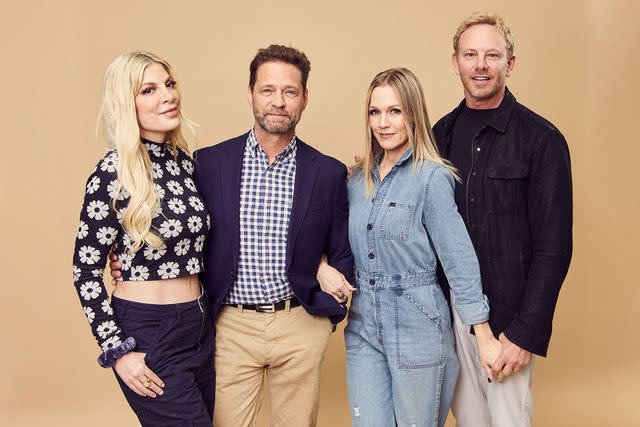 <p>Emily Assiran/Getty</p> (L-R) Tori Spelling, Jason Priestley, Jennie Garth and Ian Ziering attend 90s Con held at Connecticut Convention Center on March 18, 2023 in Hartford, Connecticut.