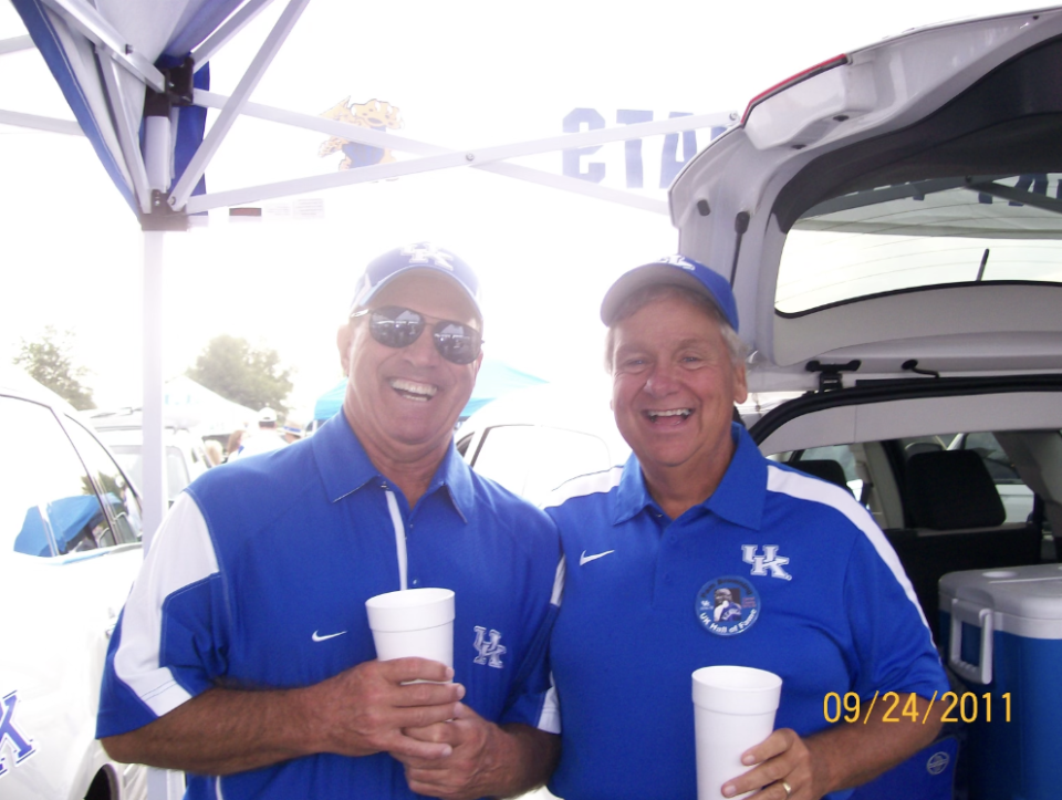 Bob Sarver and David Oney pose during a visit to a University of Kentucky football game in 2011.