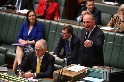 <span class="caption">At last count, seven Australian MPs have been found to be under a citizenship cloud, including deputy Prime Minister Barnaby Joyce (standing). </span> <span class="attribution"><span class="source">AAP/Mick Tsikas</span></span>