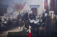 <p>A Capitol Visitor Center tour guide points up in front of John Trumbull’s “Declaration of Independence” painting in the Capitol Rotunda in Washington, D.C., on June 28, 2017. (Photo: Bill Clark/CQ Roll Call/Getty Images) </p>