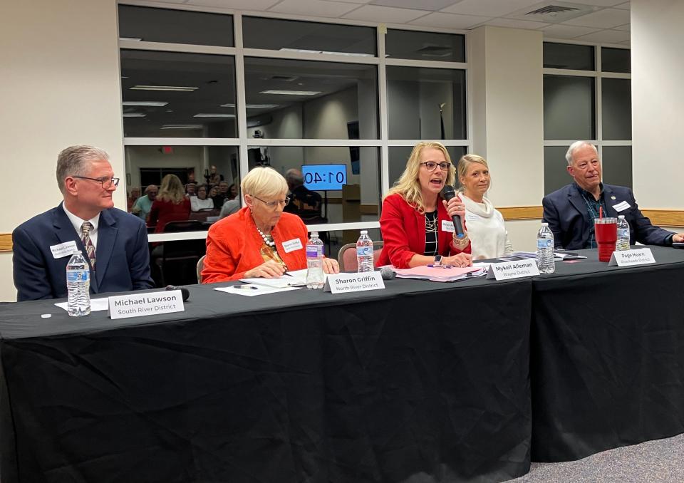 Mike Lawson (from left), Sharon Griffin, Mykell Alleman, Page Hearn and Nick Collins take part in a school board candidate forum in Verona Oct. 16.