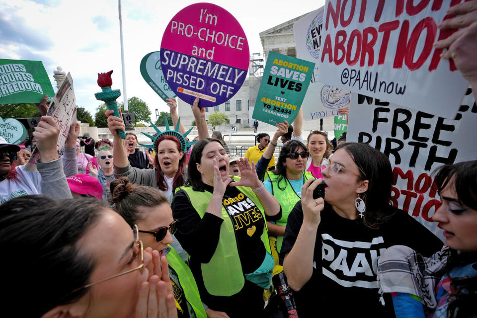 Abortion rights supporters confront anti-abortion activists, right, outside the Supreme Court on April 24, 2024.  (Andrew Harnik / Getty Images)