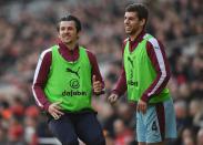 <p>Burnley’s Joey Barton and Jon Flanagan look on eagerly </p>