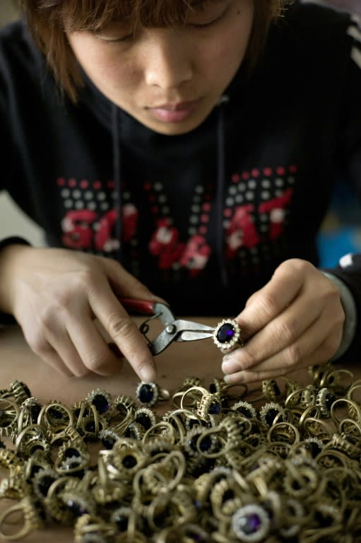 The commercial potential of the upcoming royal wedding has not escaped China's savvy entrepreneurs. This factory in Yiwu, east China is producing replicas of the blue 18-carat sapphire and diamond engagement ring that once belonged to Princess Diana