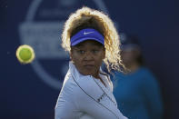 Naomi Osaka, of Japan, prepares to hit a return to Coco Gauff, of the United States, at the Mubadala Silicon Valley Classic tennis tournament in San Jose, Calif., Thursday, Aug. 4, 2022. (AP Photo/Godofredo A. Vásquez)