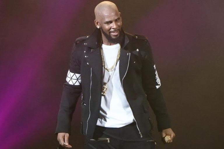 R Kelly charged with abusing multiple victims including three underage girls